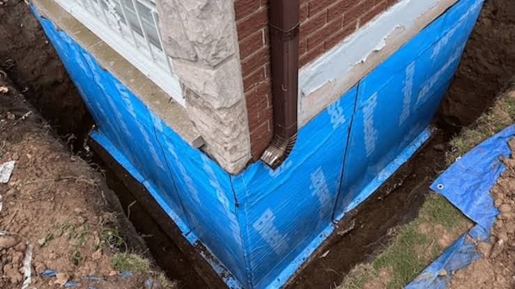 Citified Planning and Construction crew performing basement waterproofing in Surrey