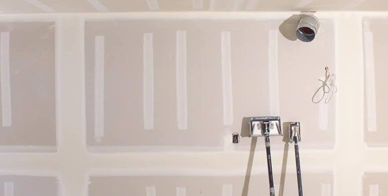 Drywall mudding and taping finish work by Citified Planning & Construction in Surrey