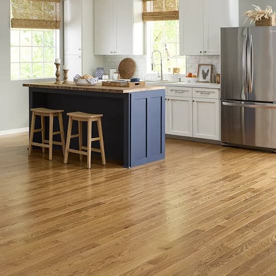 Solid hardwood flooring installed in a Surrey home
